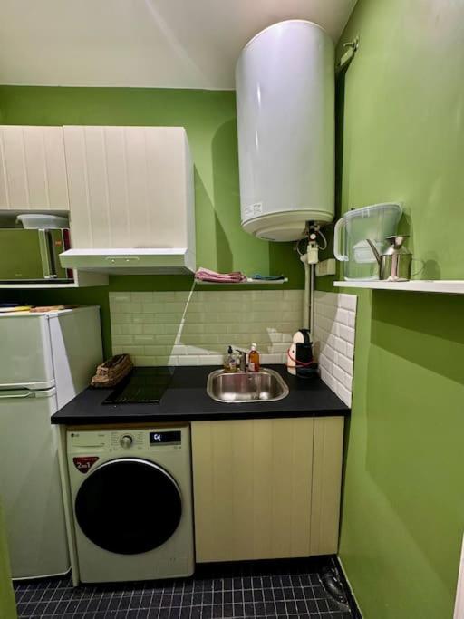 Appartement Au Coeur De Parigi Esterno foto